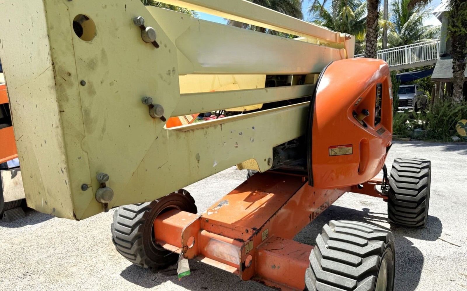 man with Boom Lift Financing and Boom Lift Financing truck